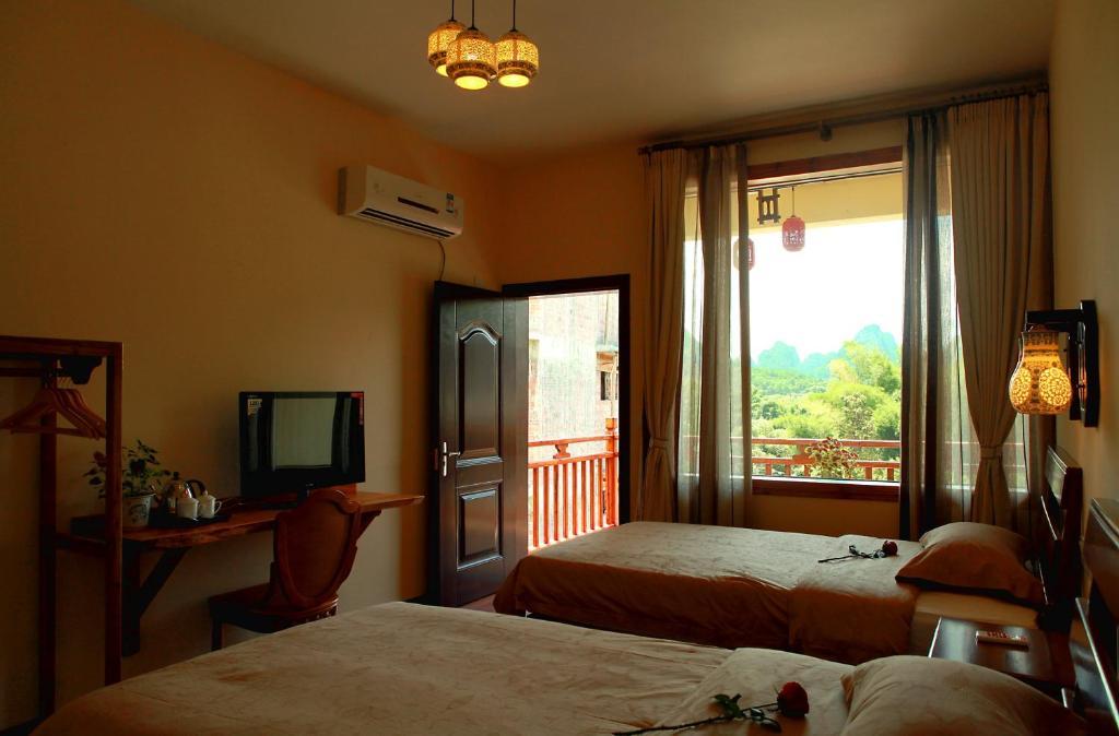 Snow Lion Riverside Resort Yangshuo Room photo